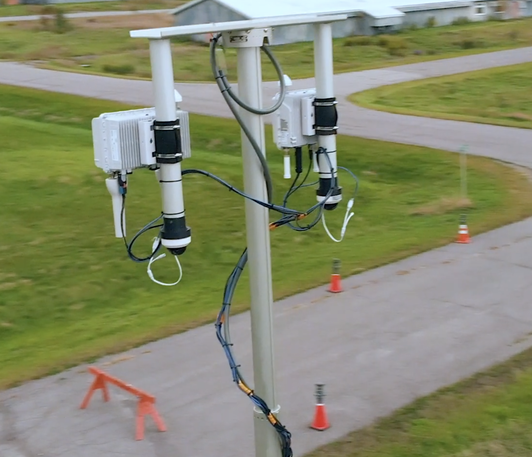 PatrIoT Edge Node with dual PTZ cameras mounted on a mast