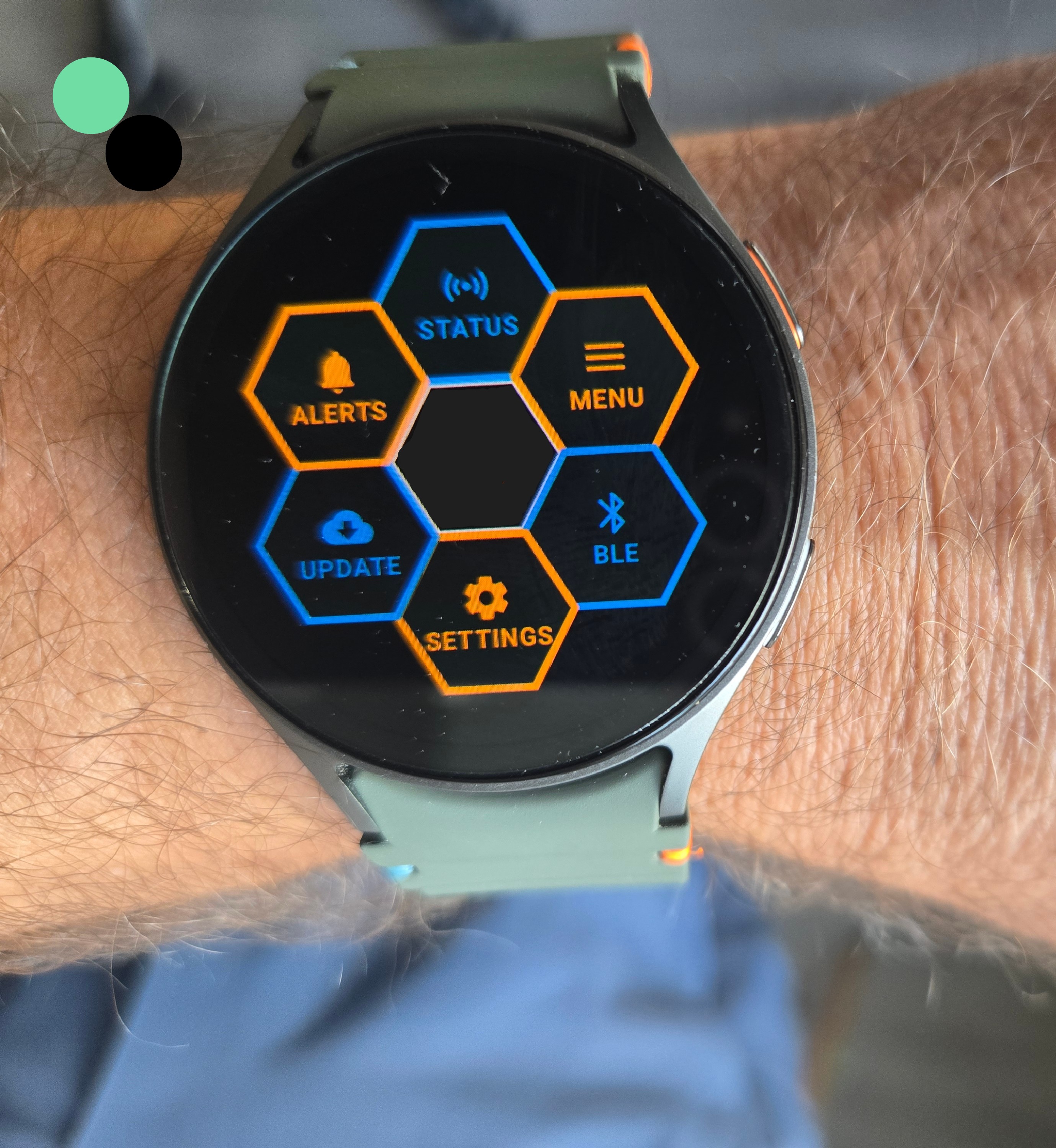 RoadDefender wearable menu running on a Samsung Galaxy Watch, worn on a worker's wrist in the field